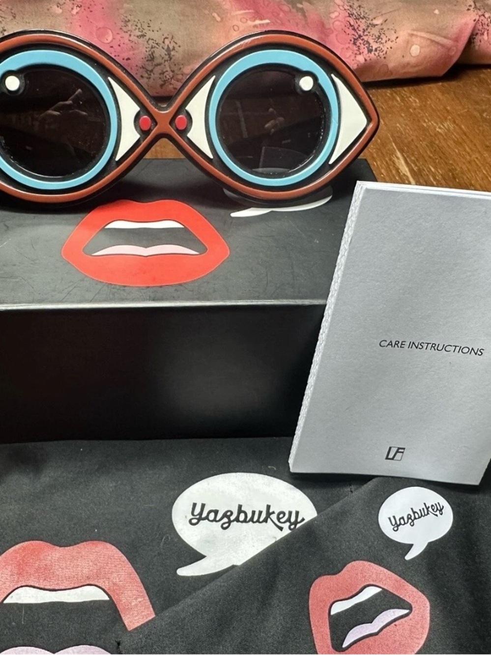 Novelty Round Sunglasses in Red and Blue by
